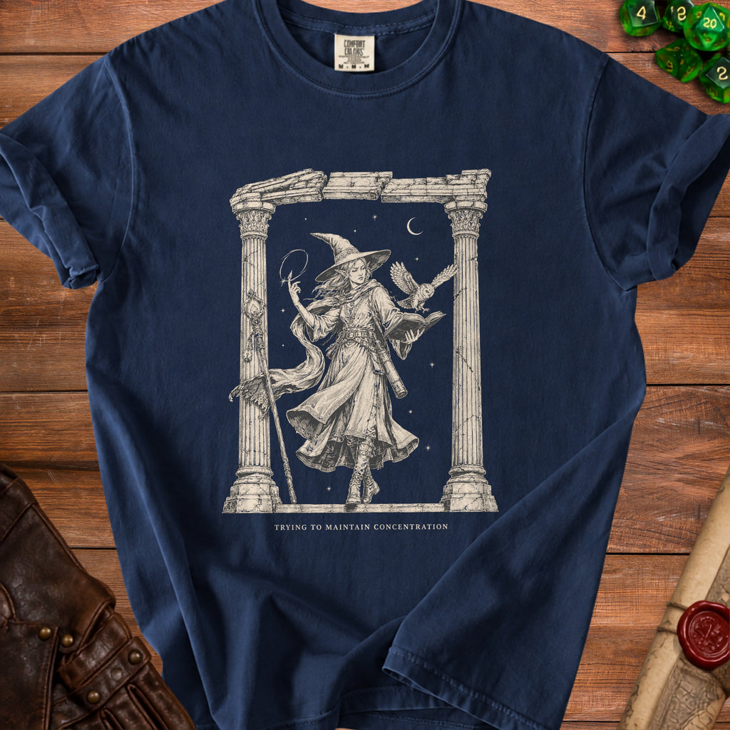 Navy t-shirt with witch and owl illustration and text "Trying to Maintain Concentration".