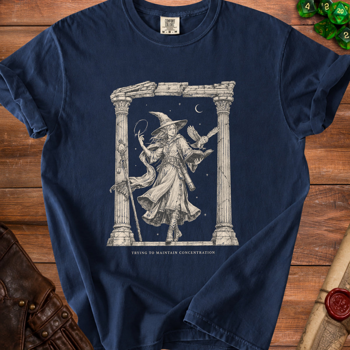 Navy t-shirt with witch and owl illustration and text "Trying to Maintain Concentration".
