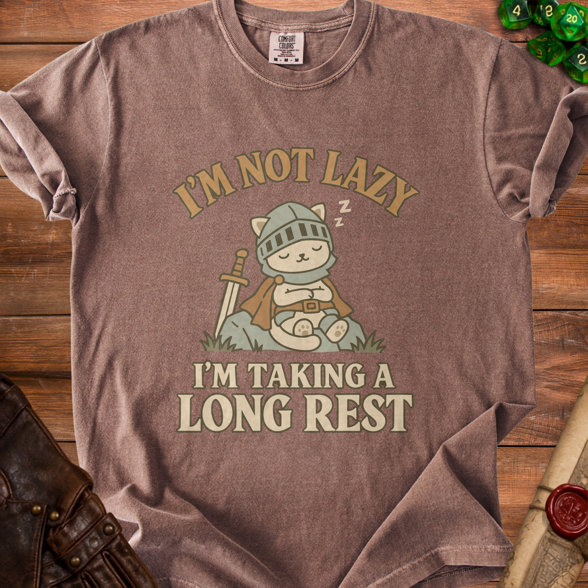 Brown t-shirt with a knight cat graphic and the text "I'm not lazy, I'm taking a long rest."