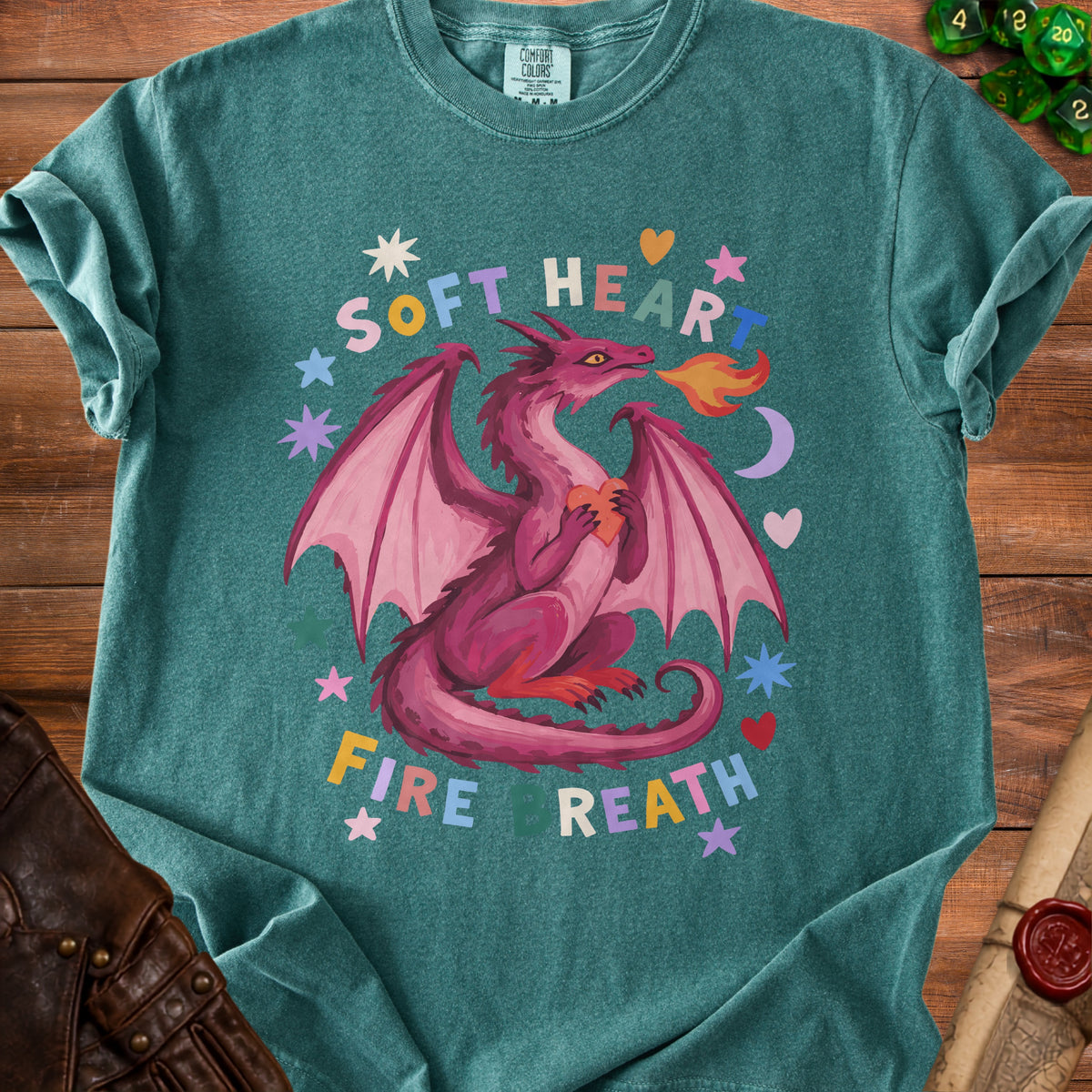 Pink dragon with heart breathes fire, text "SOFT HEART FIRE BREATH".