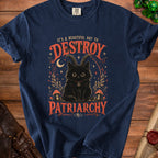 Navy t-shirt with black cat with horns, mushrooms, moon, and text "IT'S A BEAUTIFUL DAY TO DESTROY PATRIARCHY".