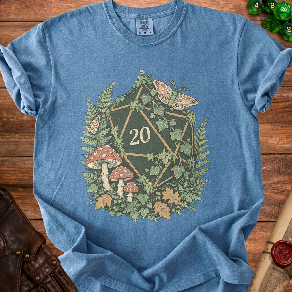 Blue t-shirt with a d20 dice surrounded by mushrooms, ferns, ivy, and moths.