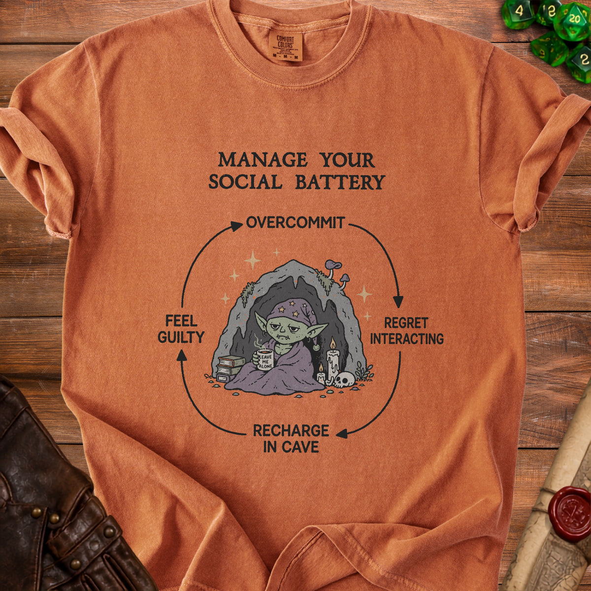 "Manage Your Social Battery" graphic with a goblin recharging in a cave.