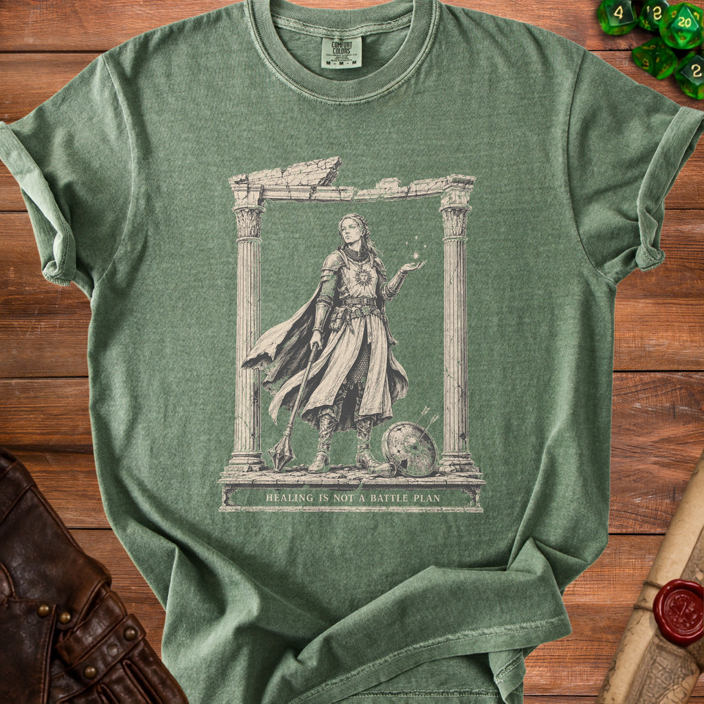 Green t-shirt with warrior illustration and text "HEALING IS NOT A BATTLE PLAN."