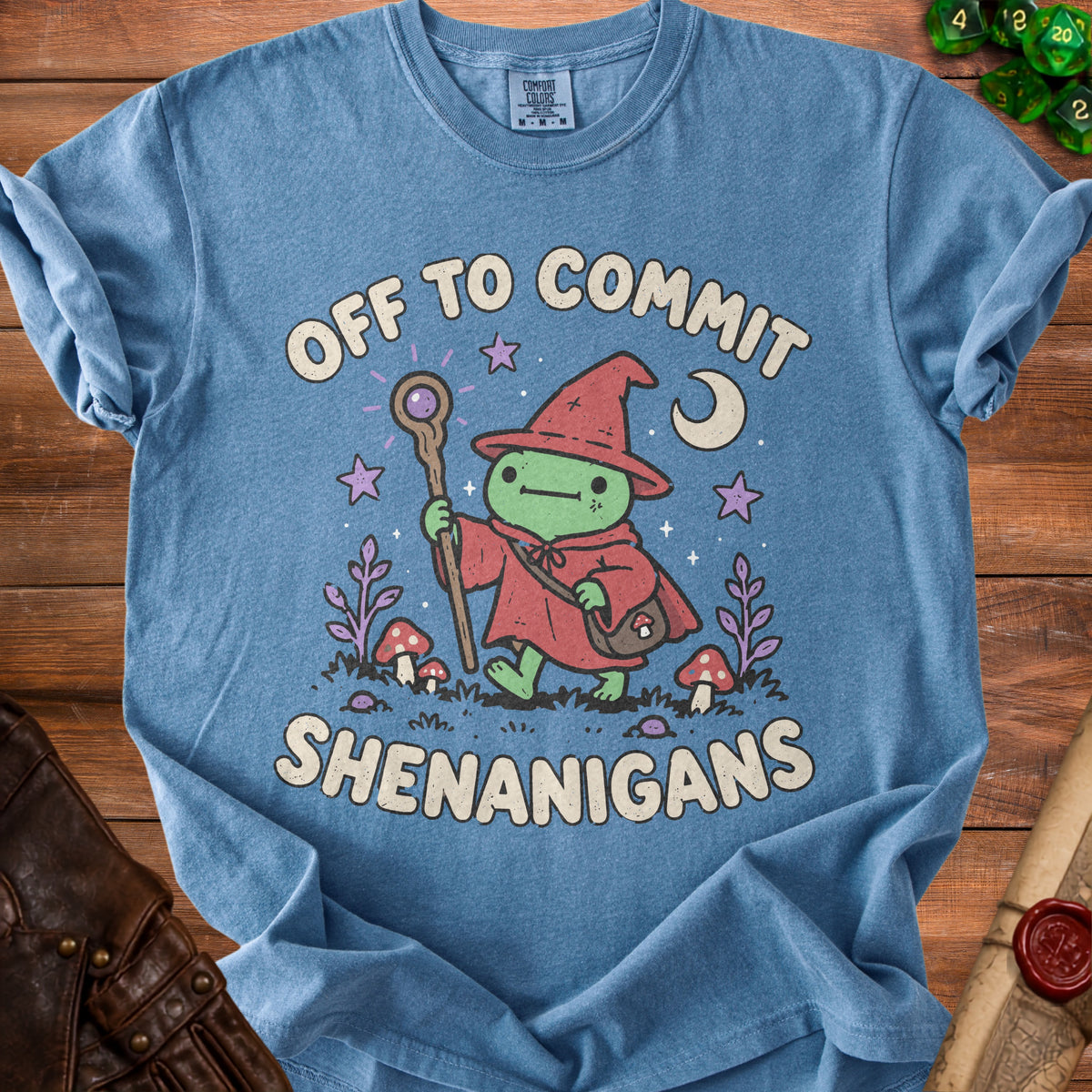 Blue t-shirt with cartoon wizard frog holding staff and text "Off to Commit Shenanigans".
