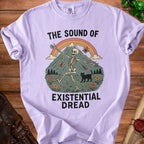 Skeleton dancing with a cat on a mountain under a rainbow, text "The Sound of Existential Dread".