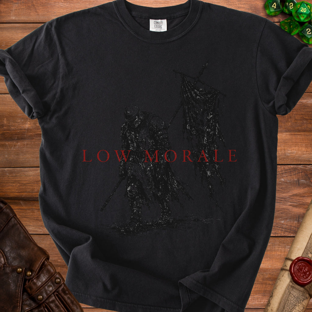 Black t-shirt with dark knight graphic and red text "LOW MORALE".