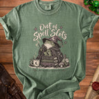 Green t-shirt with wizard frog graphic, "Out of Spell Slots" and "and emotional bandwidth" text.