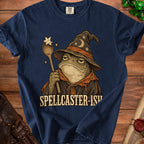Frog spellcaster graphic on a navy blue t-shirt, text reads "SPELLCASTER-ISH".