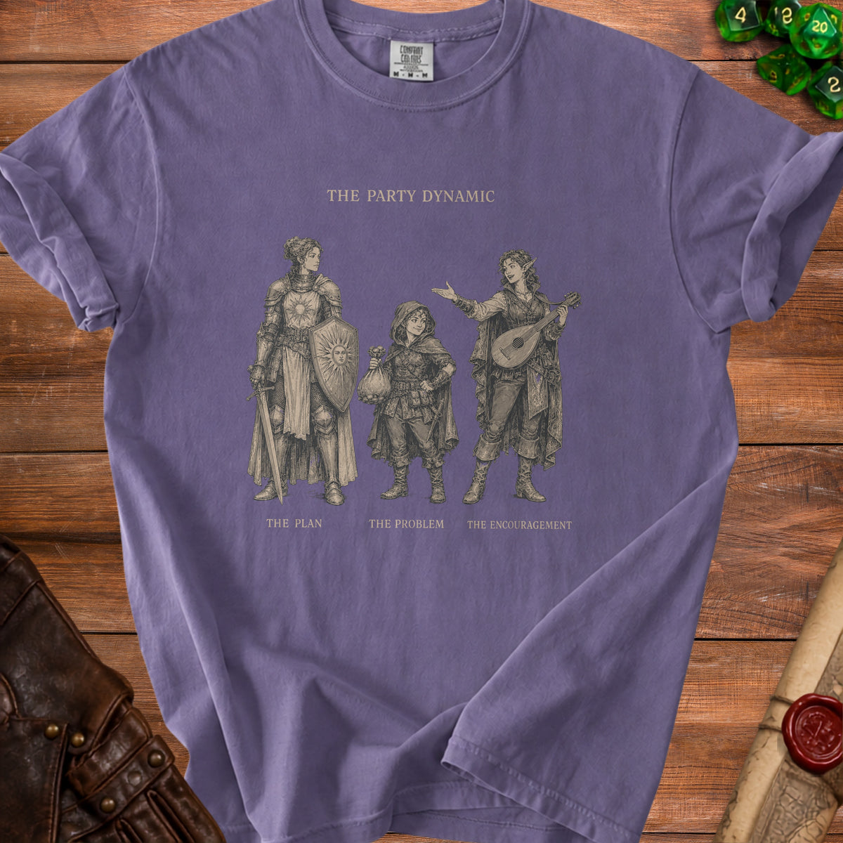 T-shirt with "The Party Dynamic" art featuring three adventurers: The Plan, The Problem, The Encouragement.