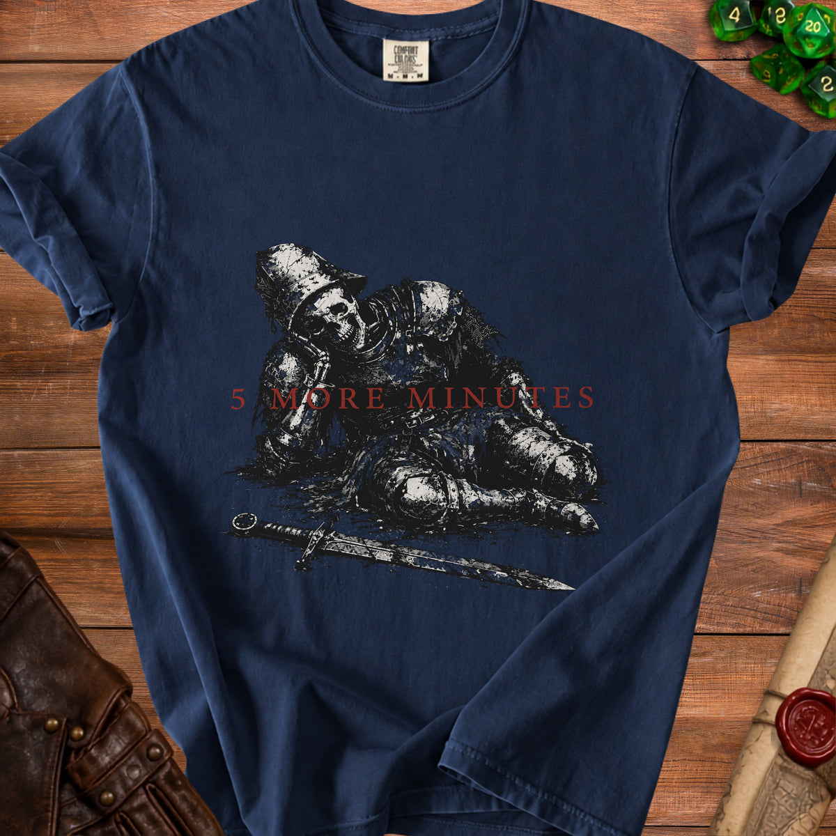 Dark blue t-shirt graphic of a skeletal knight resting with a sword and text "5 MORE MINUTES".