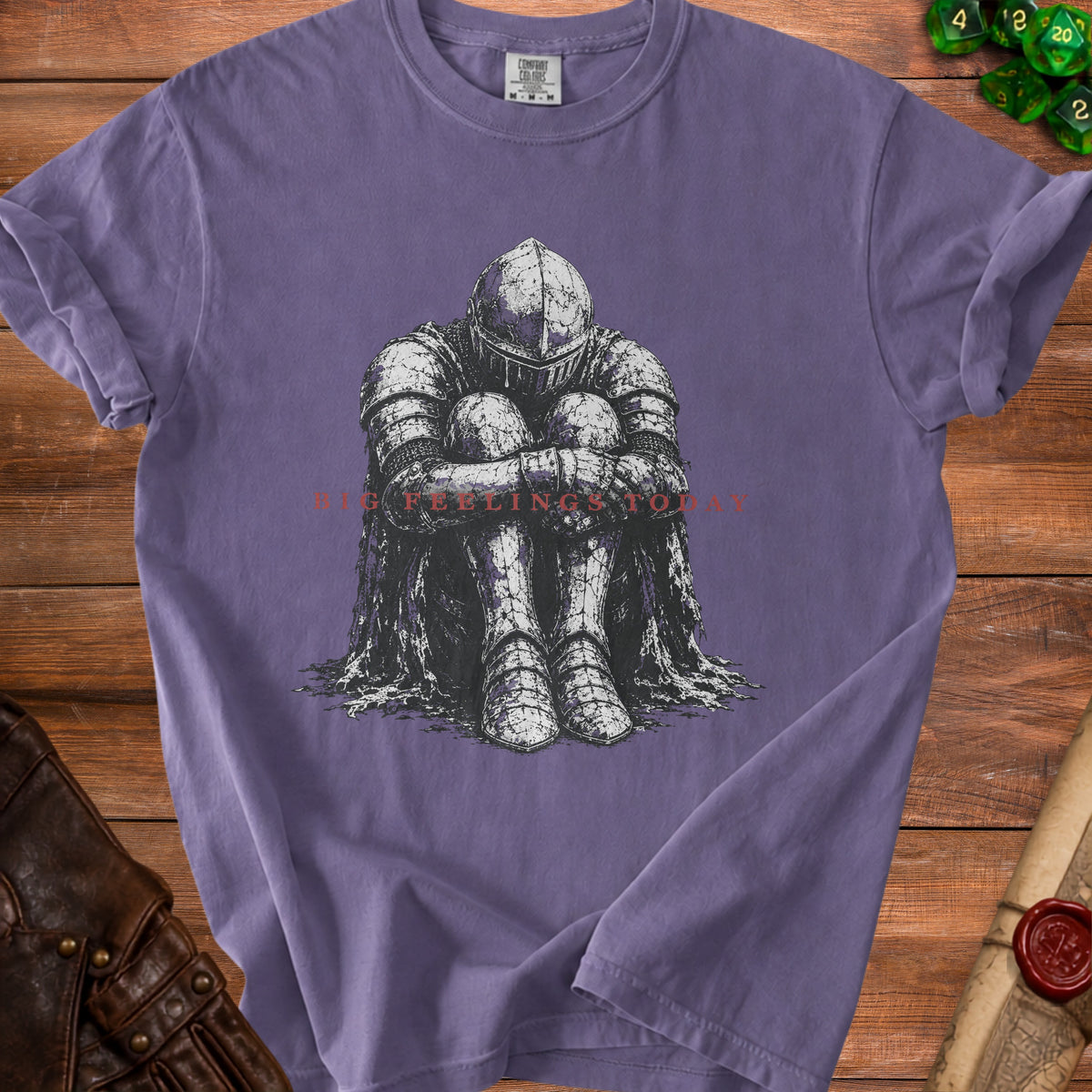 Purple t-shirt with a drawing of a knight sitting, reading "BIG FEELINGS TODAY".