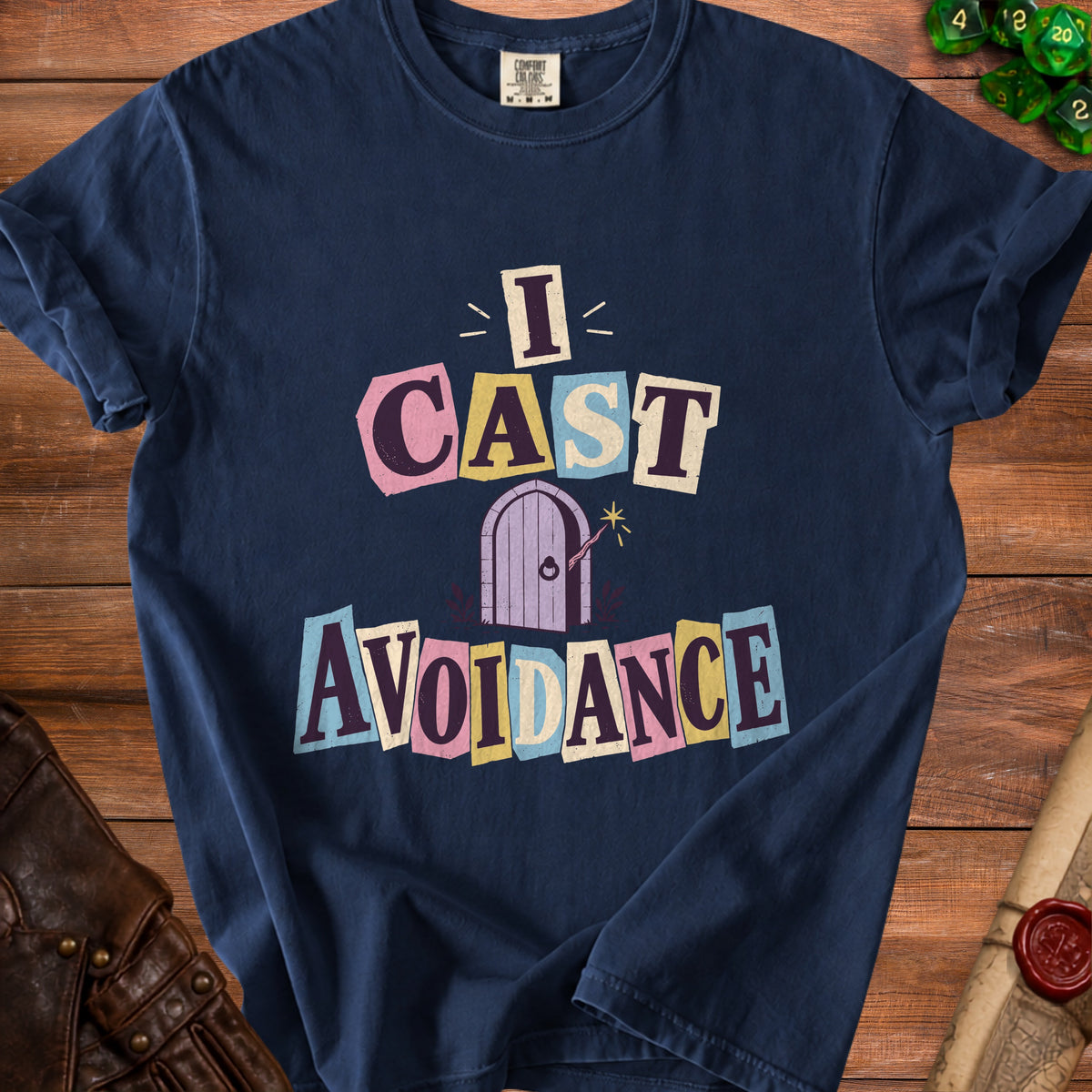 Navy t-shirt with "I Cast Avoidance" text and a magical door graphic.