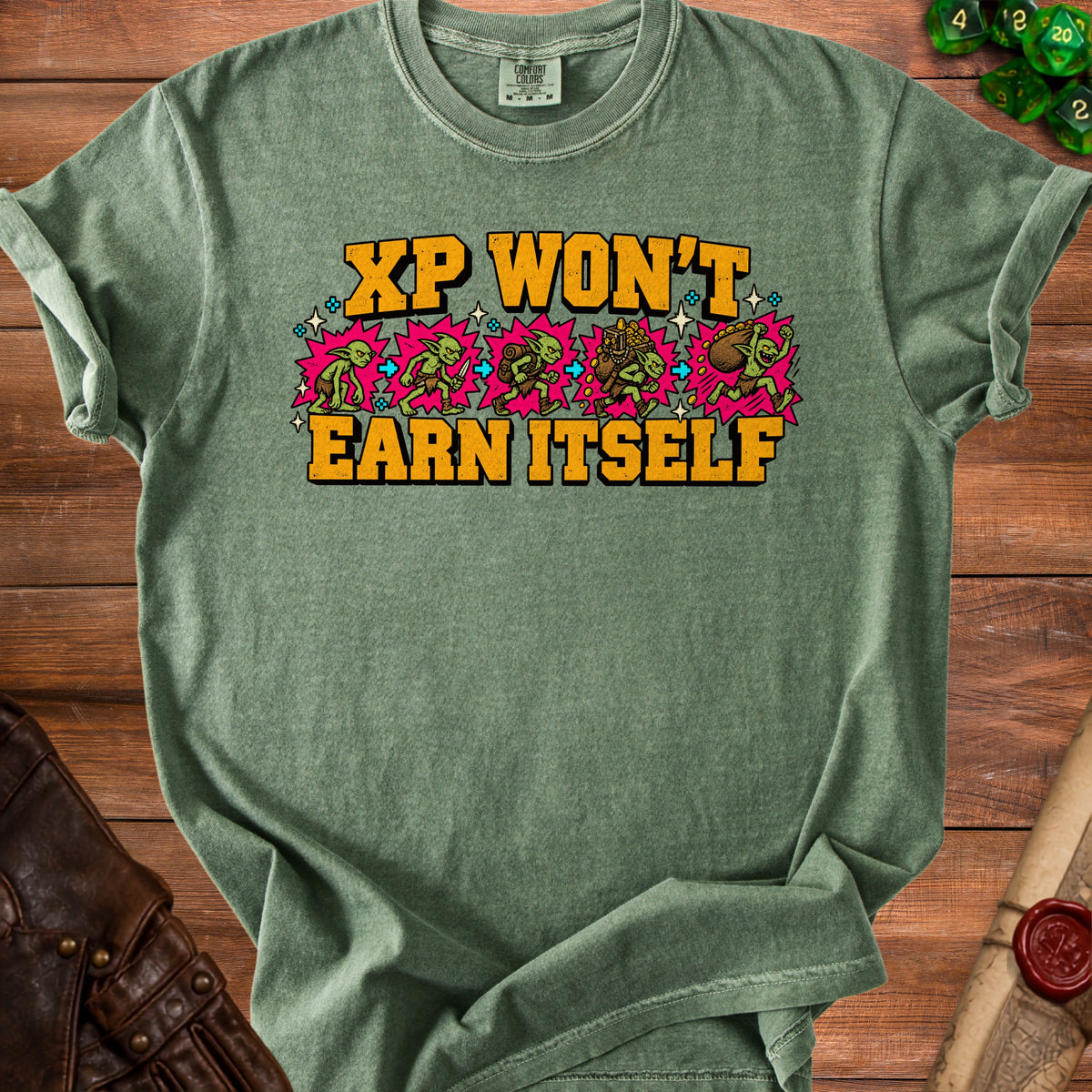 Green t-shirt with yellow text "XP WON'T EARN ITSELF" and goblin illustrations.