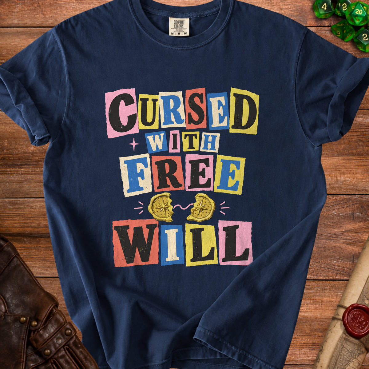 Navy t-shirt with text "Cursed With Free Will" and a broken compass graphic.