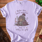 Purple t-shirt with knight graphic and text "Under this hard exterior lies a Silly lil guy".