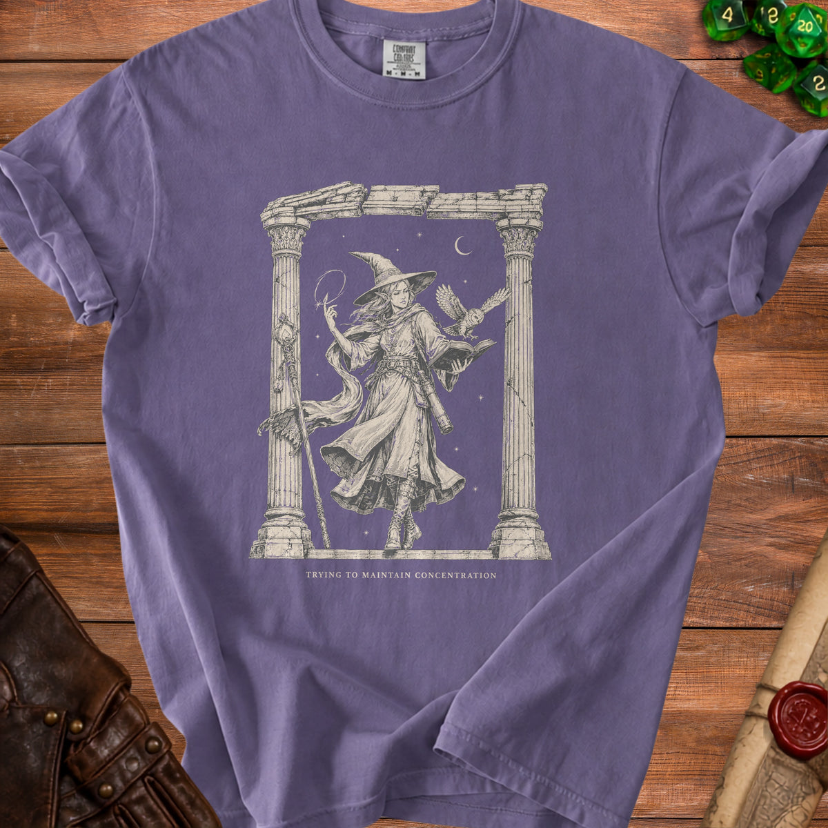 T-shirt with line art of a witch, owl, and text "TRYING TO MAINTAIN CONCENTRATION".