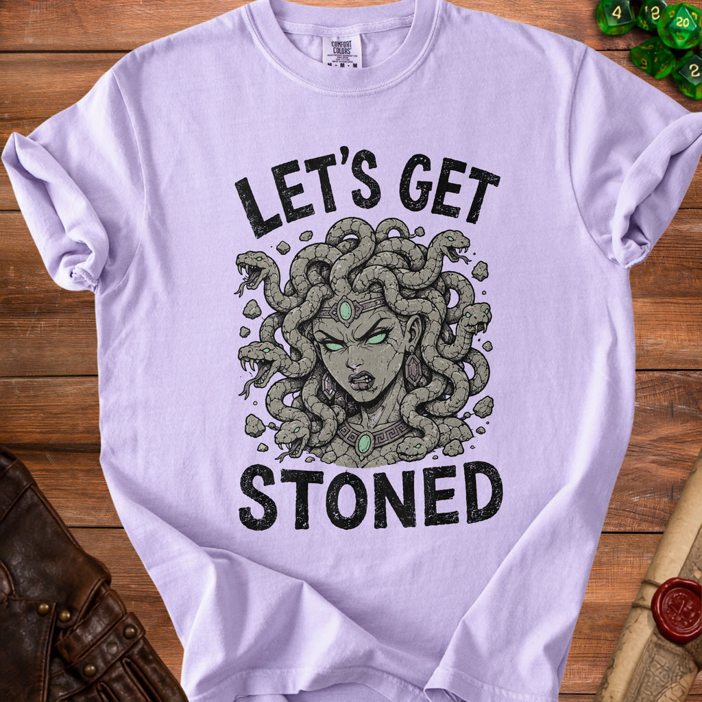 Light purple t-shirt with black text "Let's Get Stoned" and Medusa graphic.