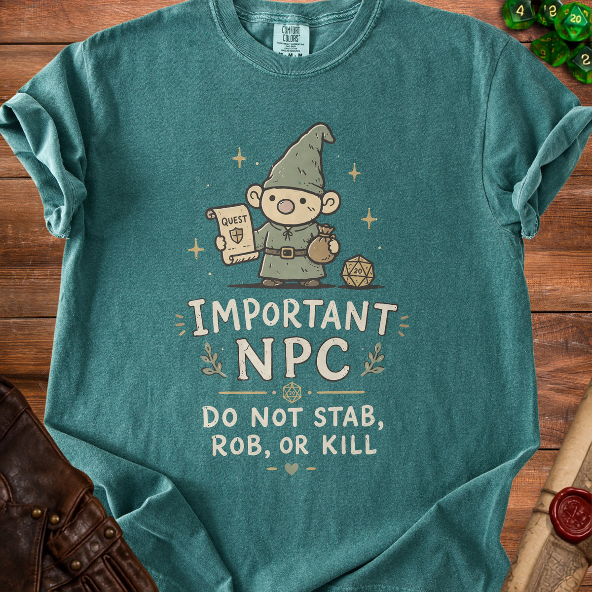 Green t-shirt with a gnome, scroll, bag, and dice. Text says "Important NPC Do Not Stab, Rob, Or Kill".