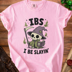 Pink t-shirt with grim reaper skeleton reading "IBS I BE SLAYIN'" graphic.