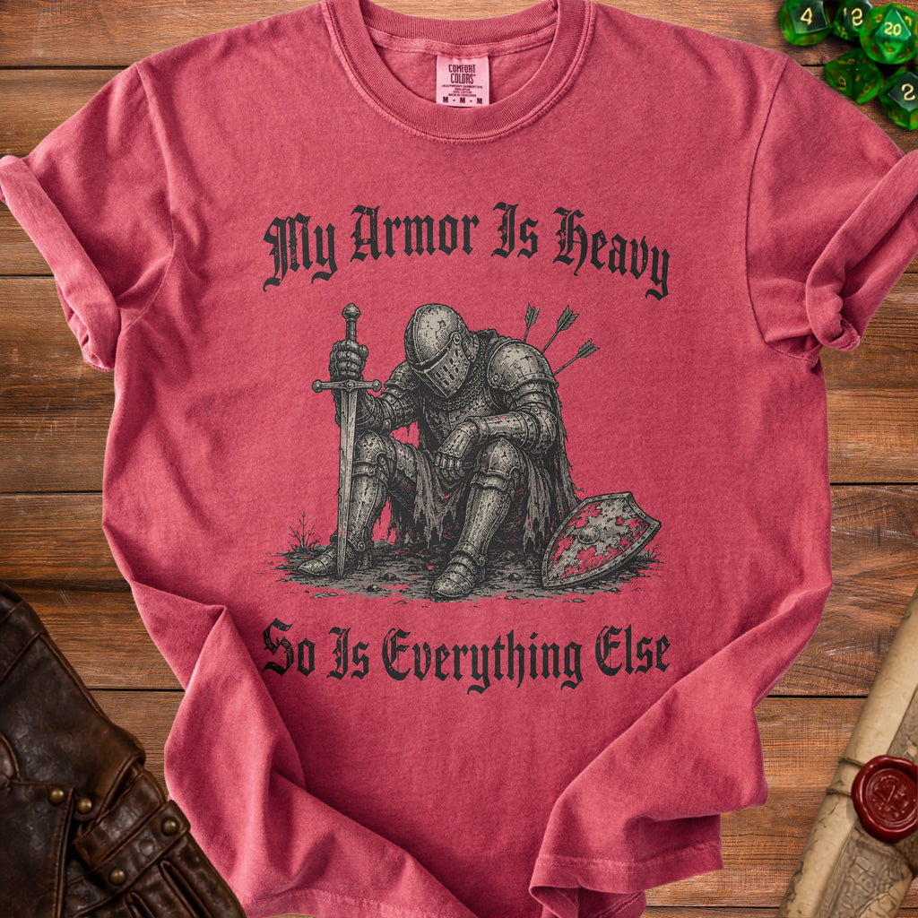 T-shirt with distressed knight graphic and text "My Armor Is Heavy So Is Everything Else".