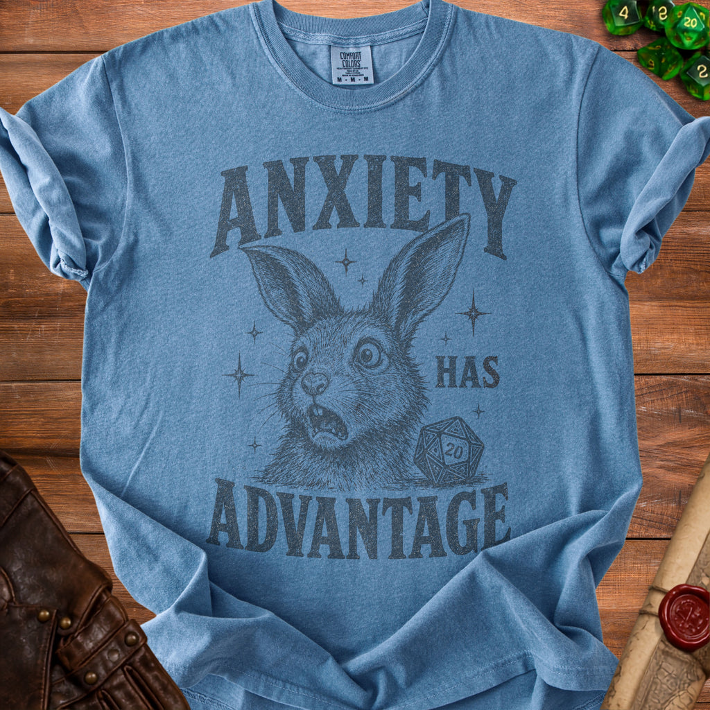 Blue t-shirt with distressed graphic of a rabbit and a d20 die reading "Anxiety Has Advantage".