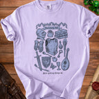 Light purple t-shirt with fantasy inventory items and text.