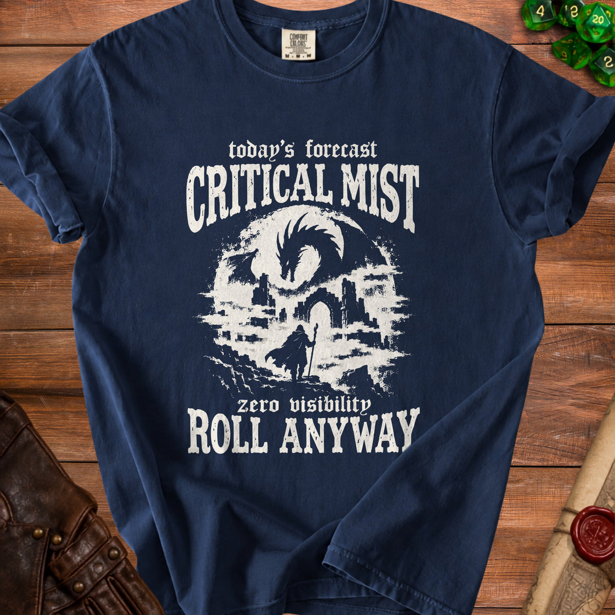 Navy t-shirt with white text and graphic of a dragon, ruins, and a cloaked figure.