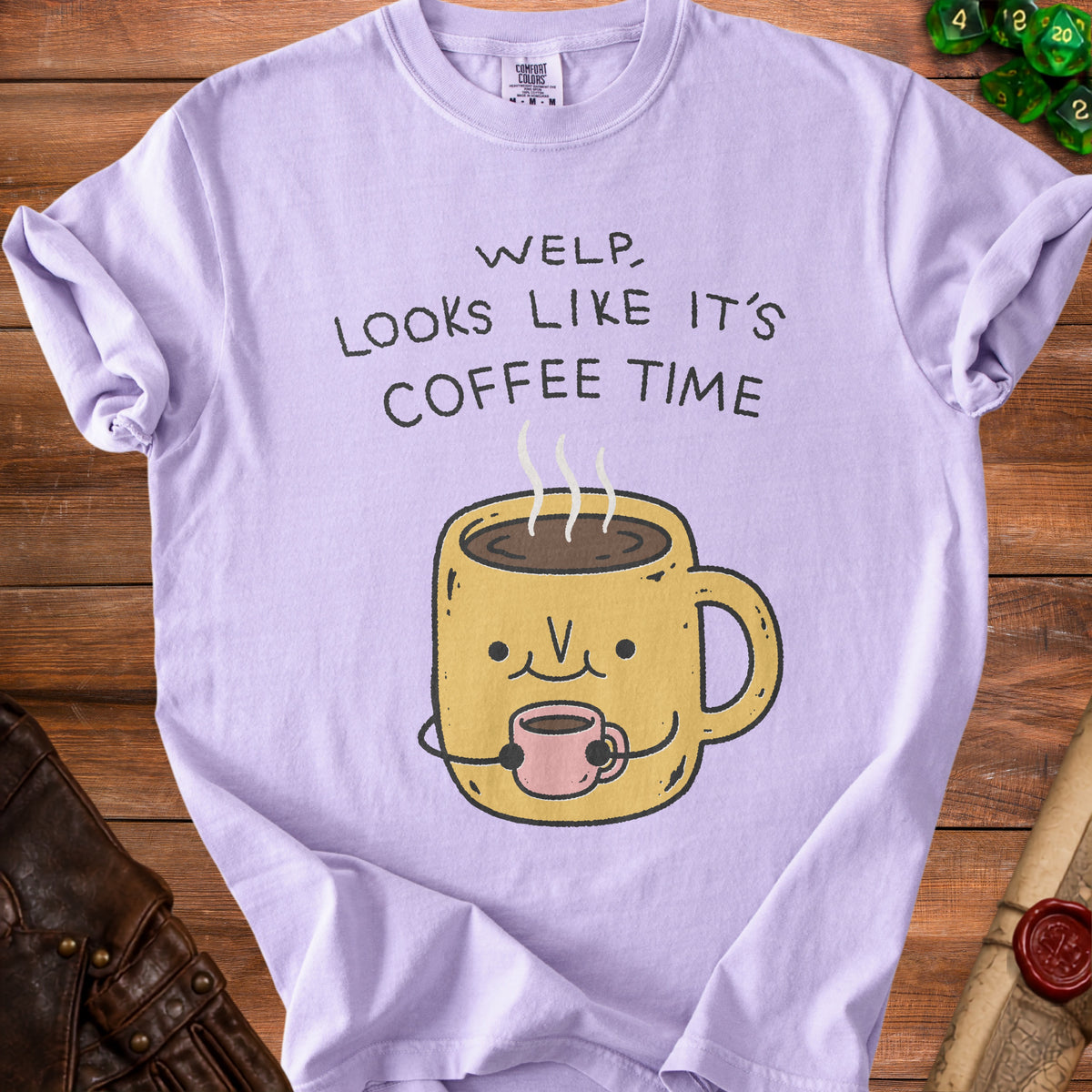 Purple t-shirt with text "WELP, LOOKS LIKE IT'S COFFEE TIME" and cartoon coffee cup.