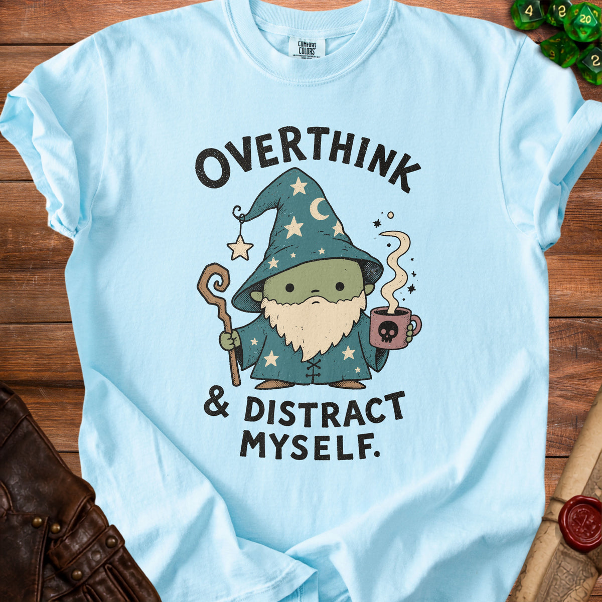 Light blue t-shirt with cartoon wizard and text "OVERTHINK & DISTRACT MYSELF."