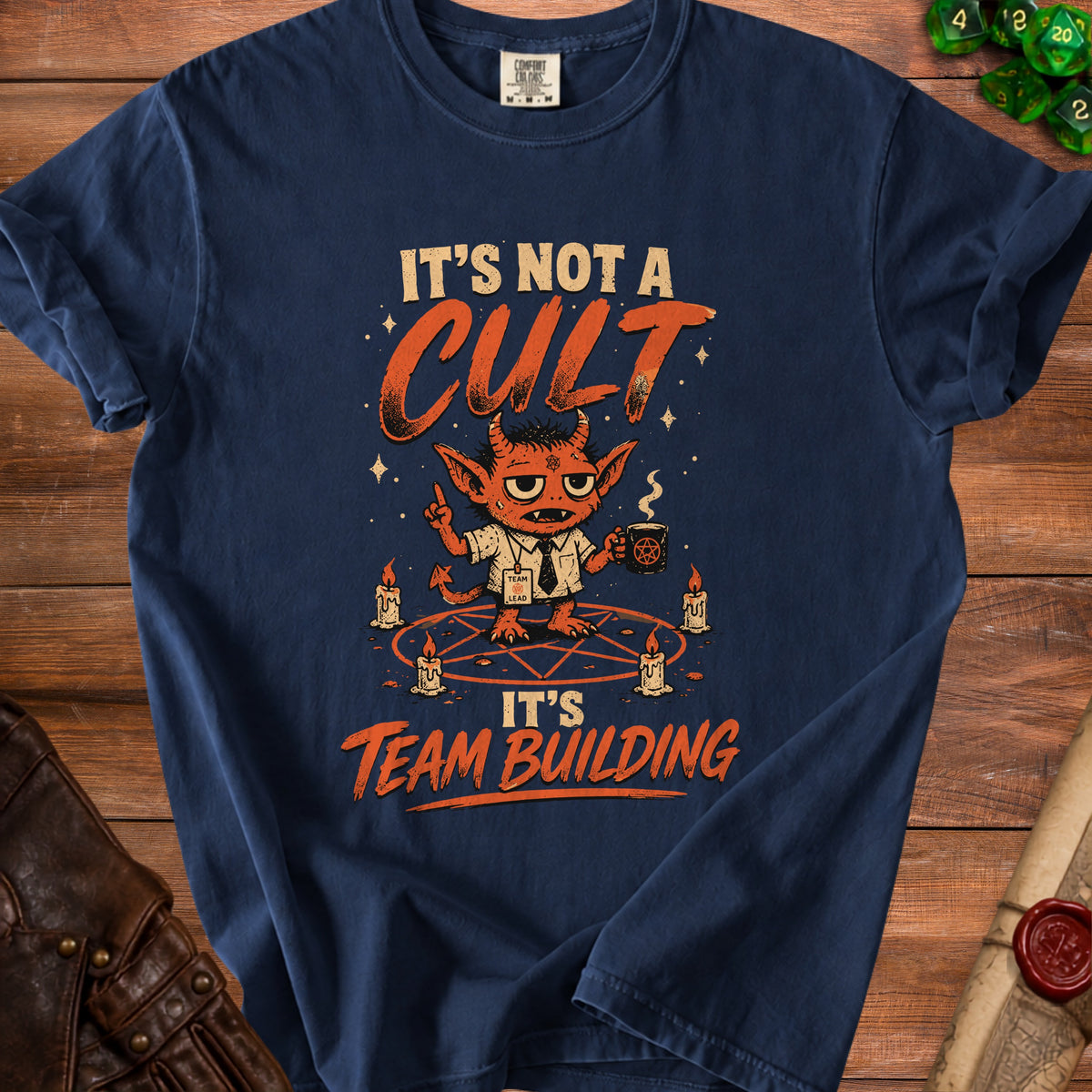 Dark blue t-shirt with a graphic that reads "IT'S NOT A CULT IT'S TEAM BUILDING".
