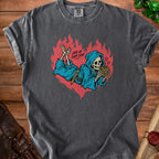 Grim reaper skeleton with treasure chest on a t-shirt with "Love at First Loot" text.