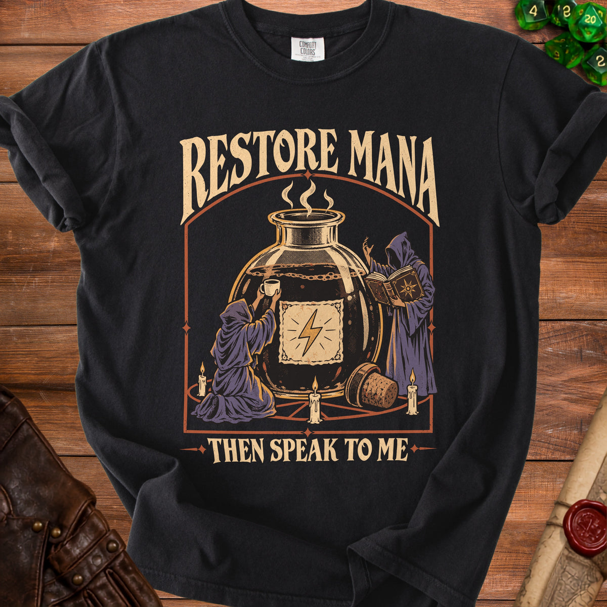 Black t-shirt with "Restore Mana Then Speak To Me" text and fantasy illustration.