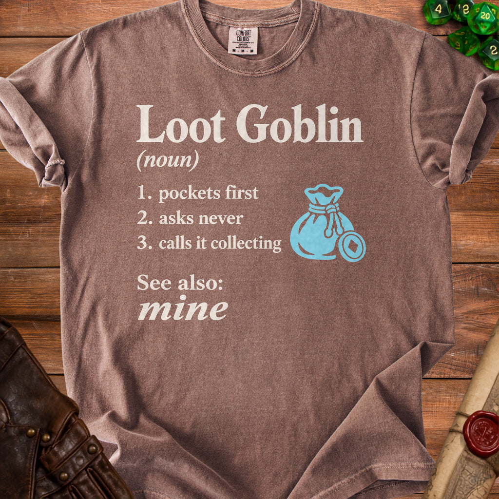 Brown t-shirt with "Loot Goblin (noun)" definition and a teal money bag icon.