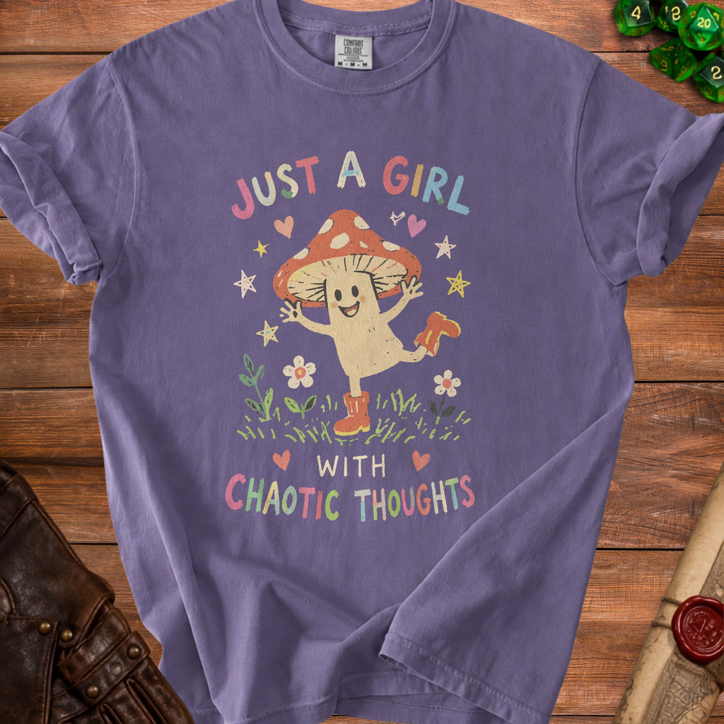 Purple t-shirt with a graphic of a mushroom character saying "Just A Girl With Chaotic Thoughts."