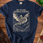 Navy t-shirt with a vintage illustration of a woman riding a dragon above a castle, and text reading, "MY PLANS INVOLVE LEAVING."