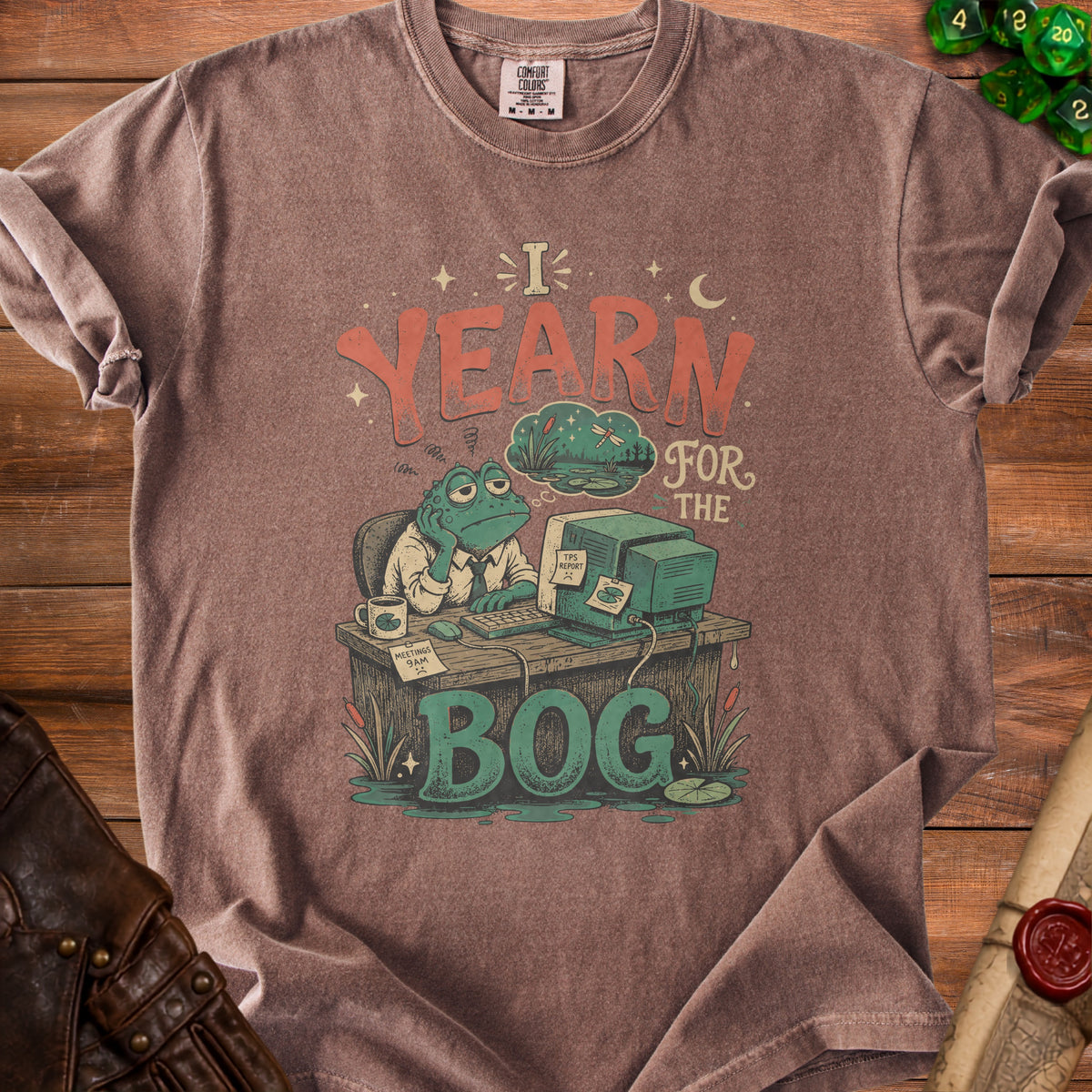 Brown t-shirt with graphic of a sad frog at a computer, text "I YEARN FOR THE BOG".