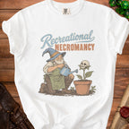 Graphic tee with wizard watering skull flower, text "Recreational Necromancy".