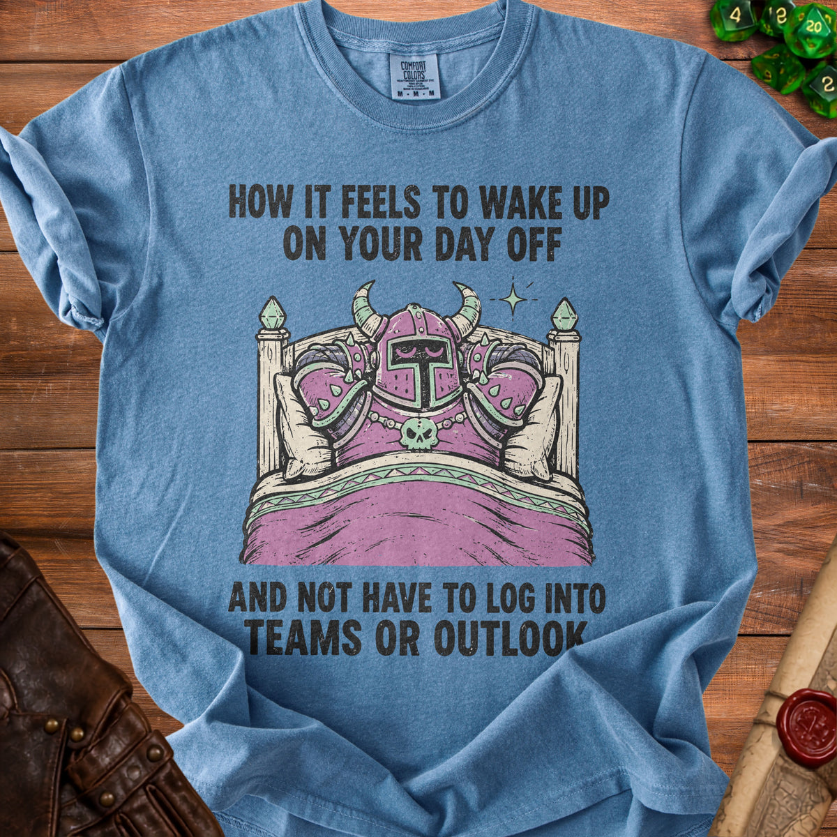 T-shirt graphic of knight in bed saying "How it feels to wake up on your day off".