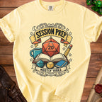 Yellow t-shirt with D20 dice, open books, and text "Session Prep Mostly Vibes".