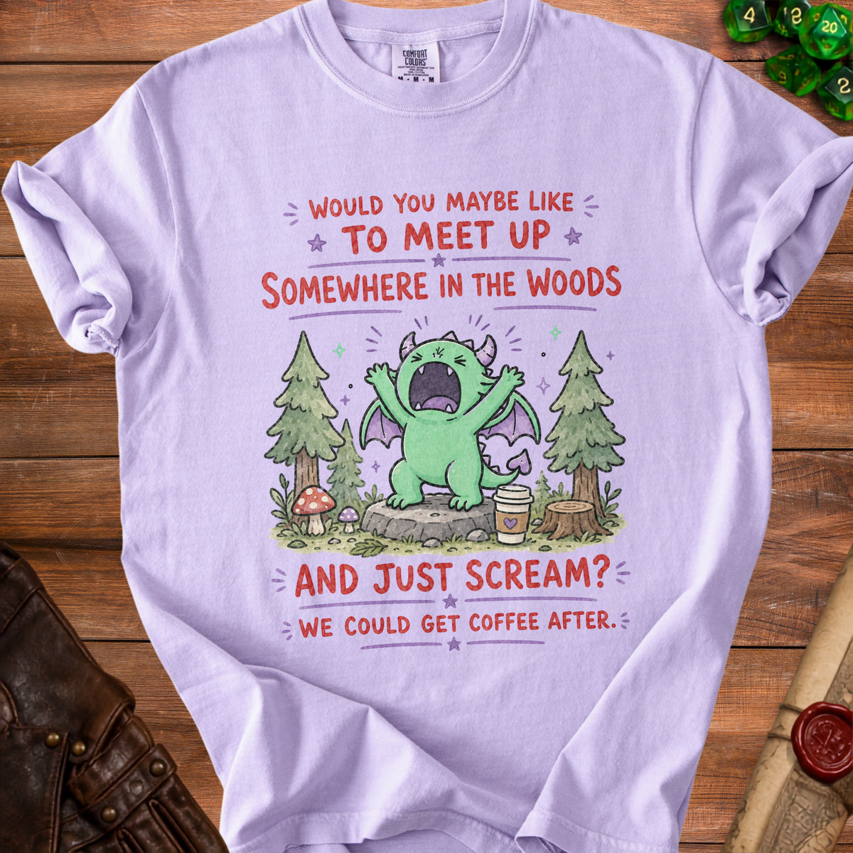 Light purple t-shirt with a cartoon dragon in woods saying "Would you maybe like to meet up somewhere in the woods and just scream?"