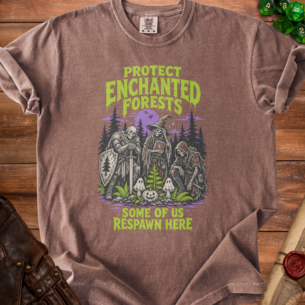 Brown t-shirt with graphic of skeletons and text "Protect Enchanted Forests" and "Some of Us Respawn Here."