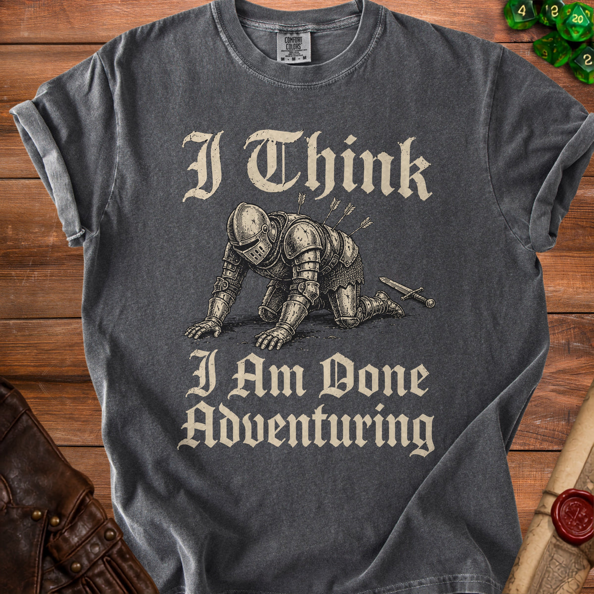 T-shirt with knight illustration and text "I Think I Am Done Adventuring".