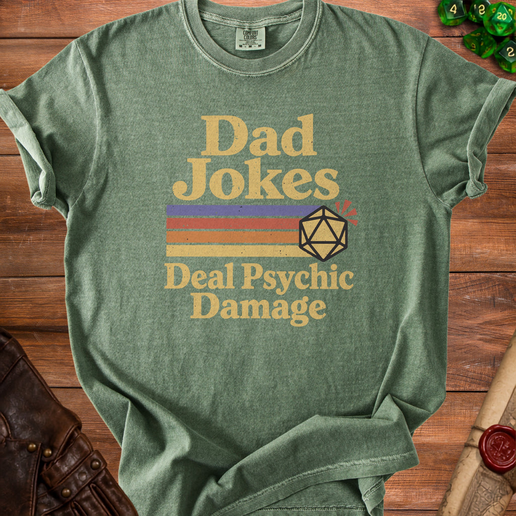 Green t-shirt with "Dad Jokes Deal Psychic Damage" and a D20 die graphic.
