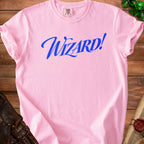 Pink t-shirt with blue "Wizard!" text and a Comfort Colors tag.