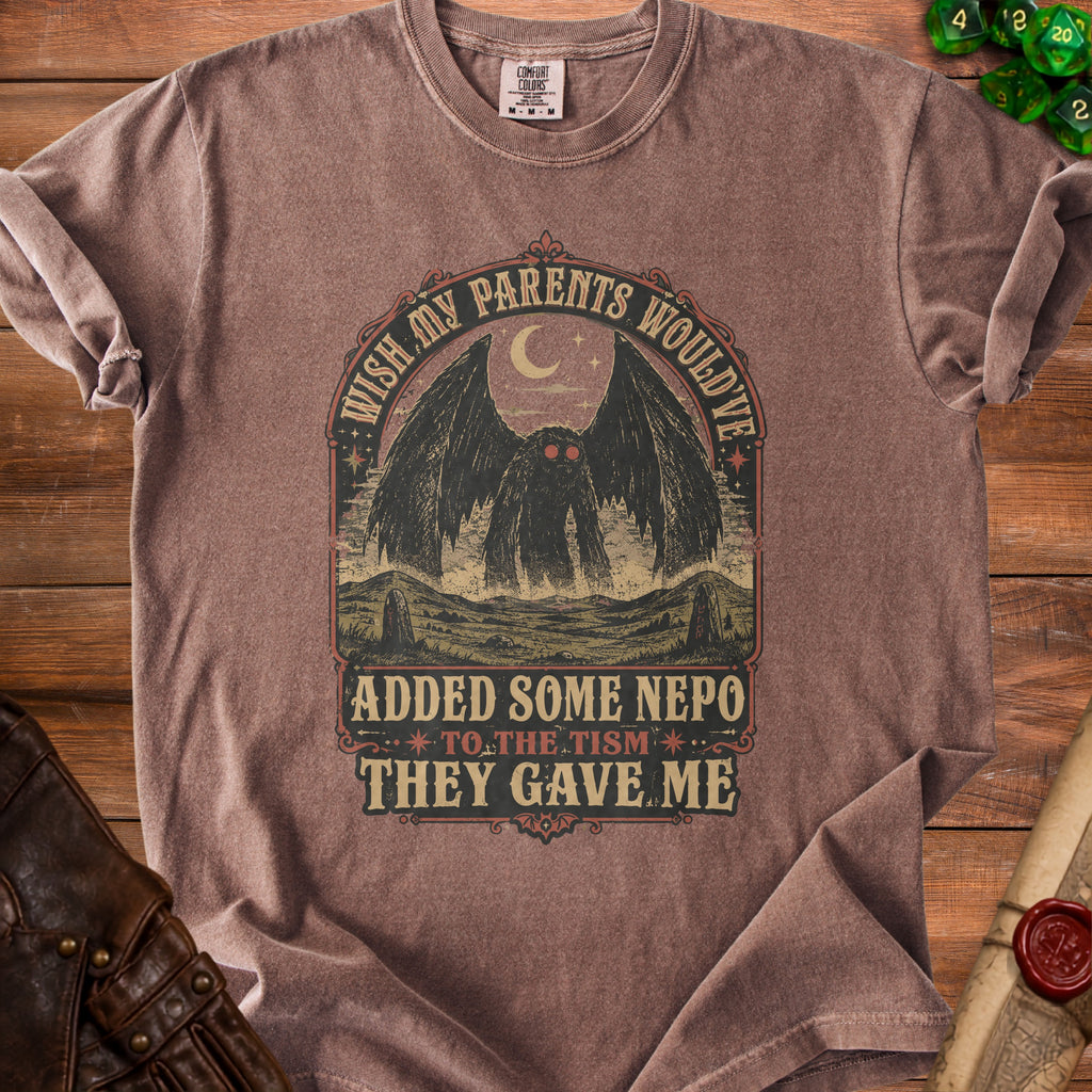 Brown t-shirt with a graphic that reads "Wish my parents would've added some nepo to the tism they gave me."