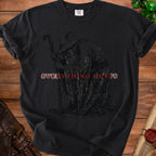 Black t-shirt with a dark, cloaked figure and the text "EVERYTHING HURTS" in red.