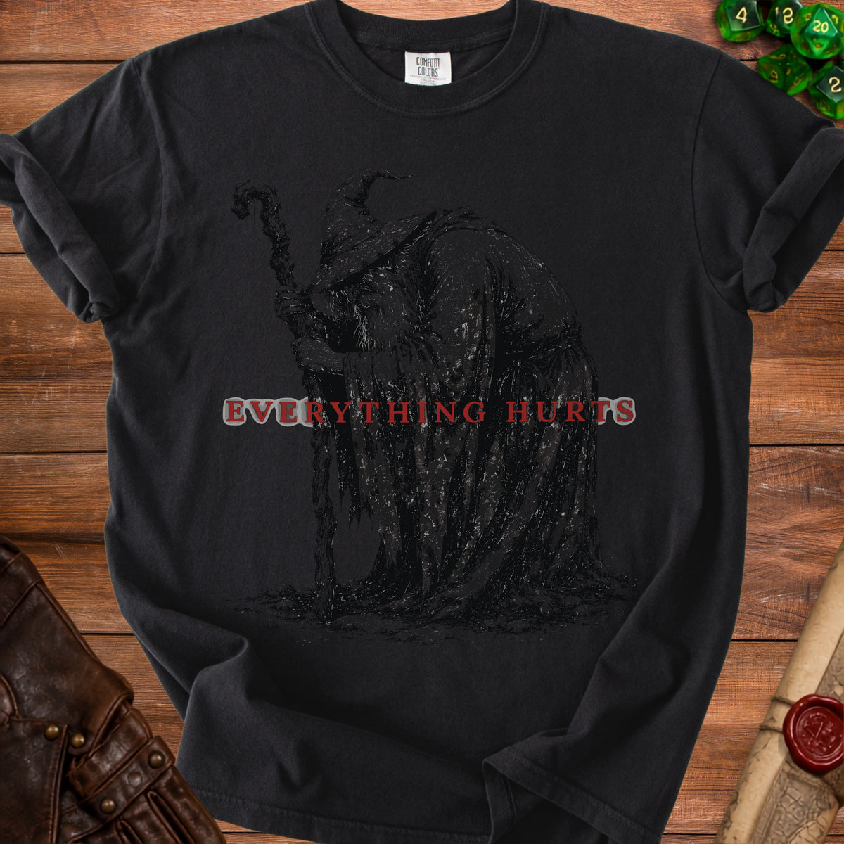 Black t-shirt with a dark, cloaked figure and the text "EVERYTHING HURTS" in red.