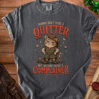 T-shirt with a cat wearing a hat and tunic that reads "Momma didn't raise a quitter, but she sure raised a complainer."