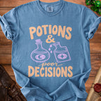 Blue t-shirt with "Potions & Poor Decisions" text and potion bottles graphic.
